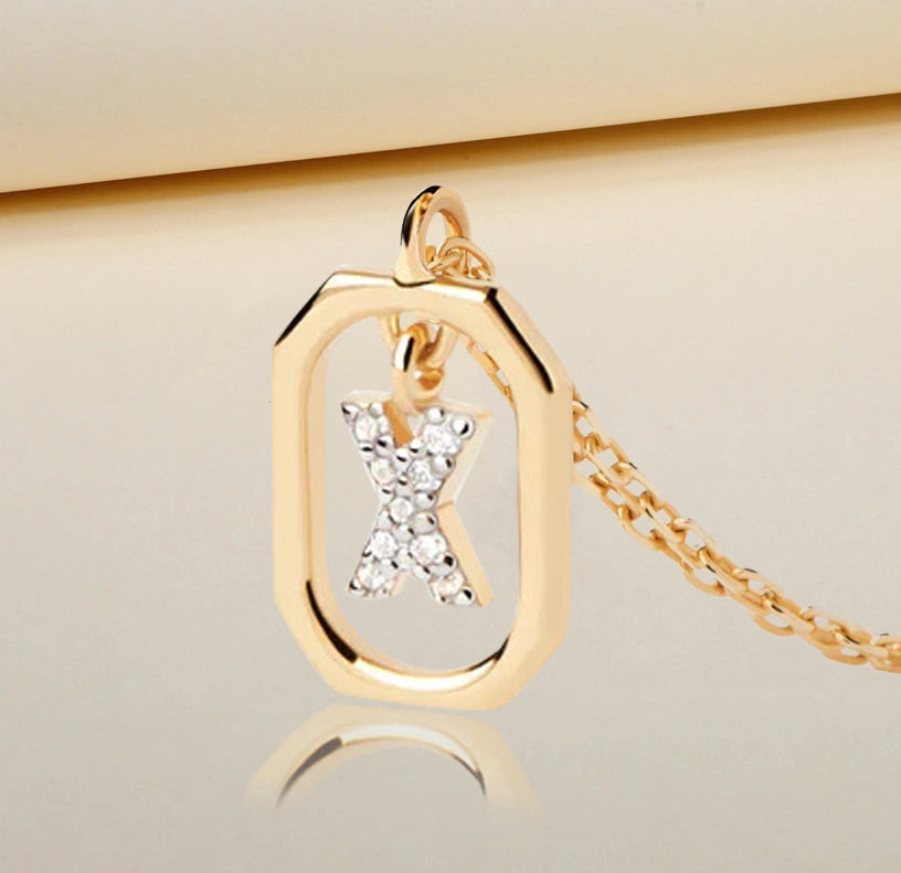 Elegant personalized necklace featuring the letter X in zircon on a gold-plated adjustable chain