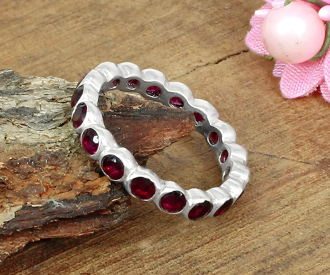 Oval pink tourmaline gemstone ring in a minimal gold setting for women