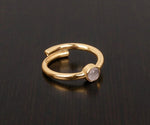 Minimalist rose quartz gemstone ring featuring a natural blush pink stone in a timeless design
