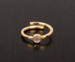 Elegant rose quartz ring with soft pink gemstone set in a delicate band perfect for everyday wear

