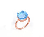 Dainty blue topaz ring in sterling silver with a minimalist and elegant design
