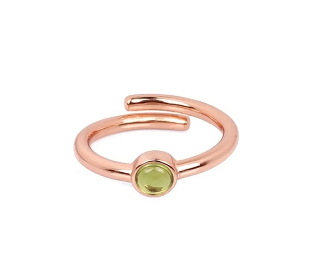 Minimalist peridot ring with oval green stone perfect for everyday wear