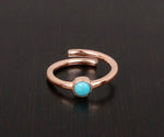 Turquoise statement ring with bold oval gemstone in a classic handcrafted setting
