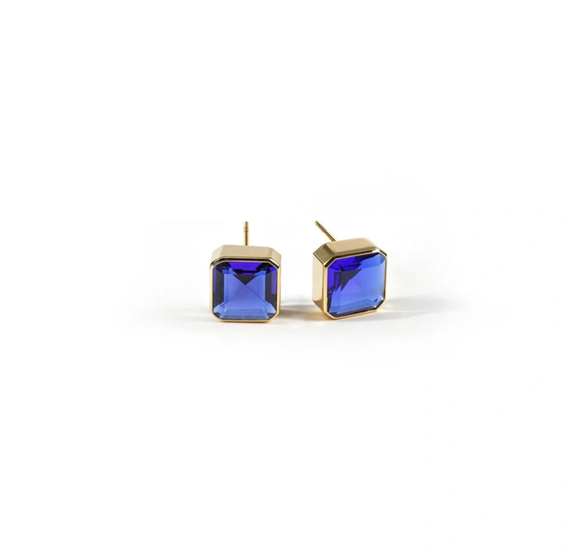 Modern square design studs with 10mm Blue Sapphire and push-back closure.