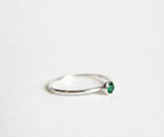 Dainty emerald gemstone ring in silver plating for a timeless jewelry look
