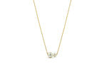 A two pearl necklace featuring two lustrous pearls on a delicate chain, creating a timeless and elegant jewelry piece.
