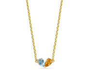 Anniversary topaz and citrine necklace featuring complementary blue topaz and golden citrine gemstones set in an elegant design to celebrate a special milestone.