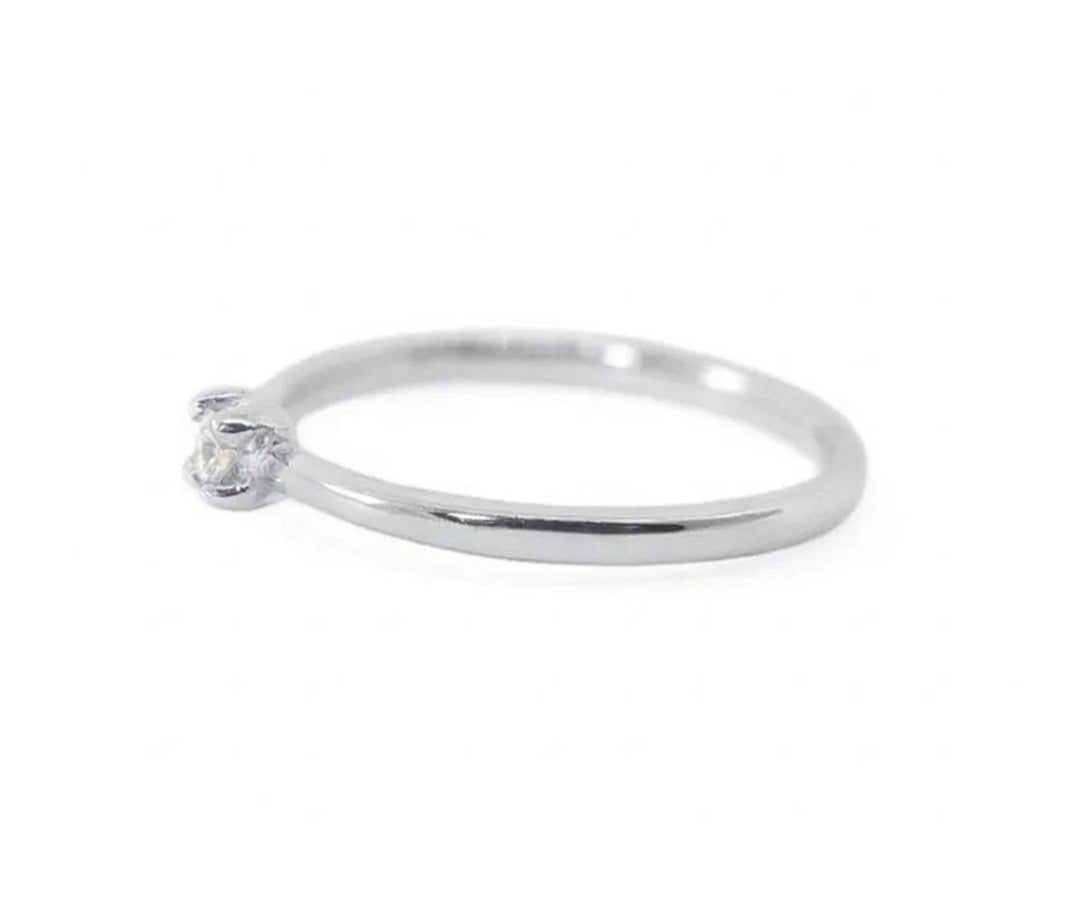 Contemporary zircon statement ring with bold design and high shine finish